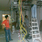 office renovation contractor with electrician providing electrical works